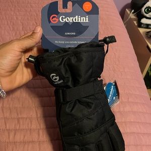 Brand new never used junior size gloves
